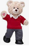 Teddy bear dressed in school uniform