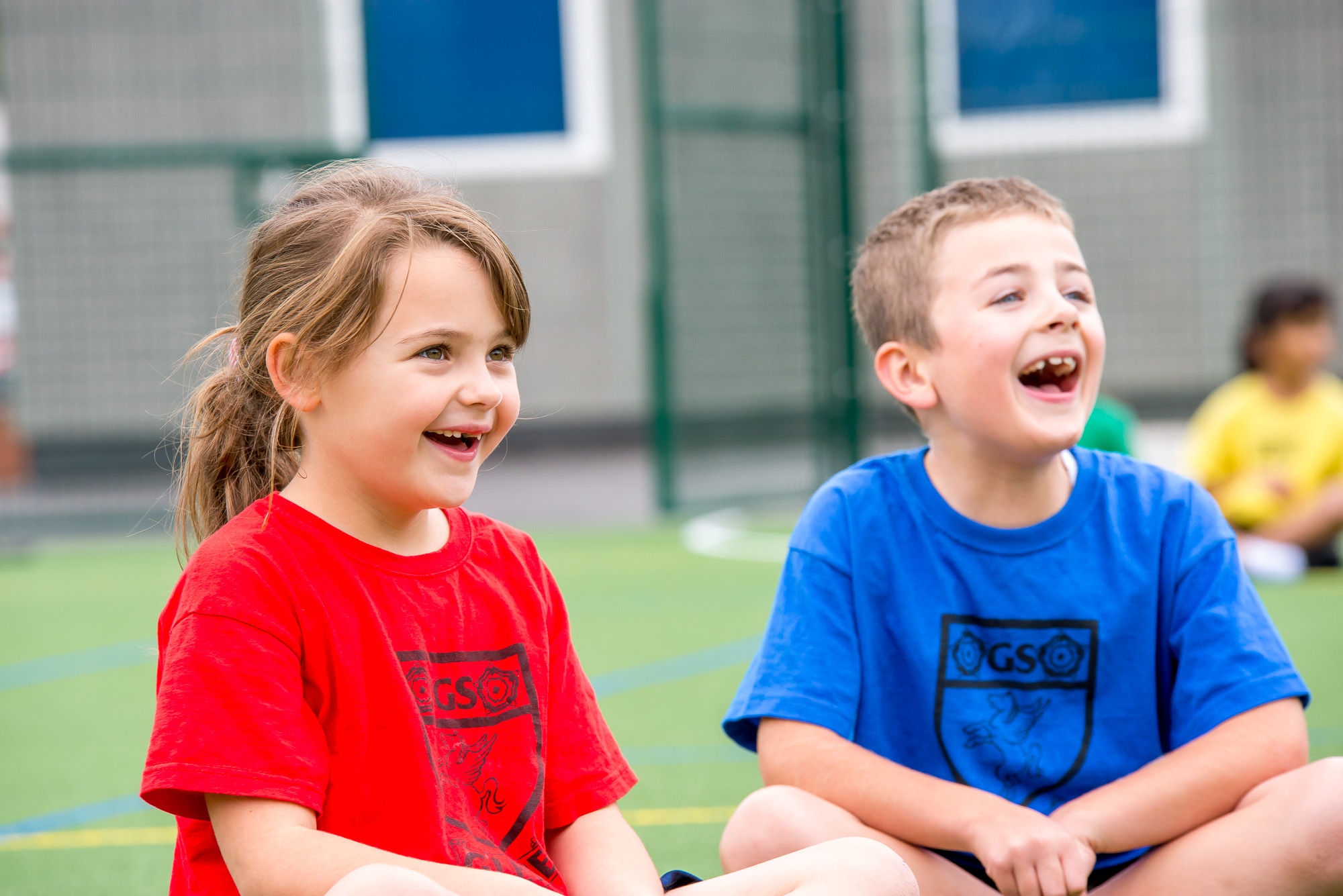 Children in the field at PE