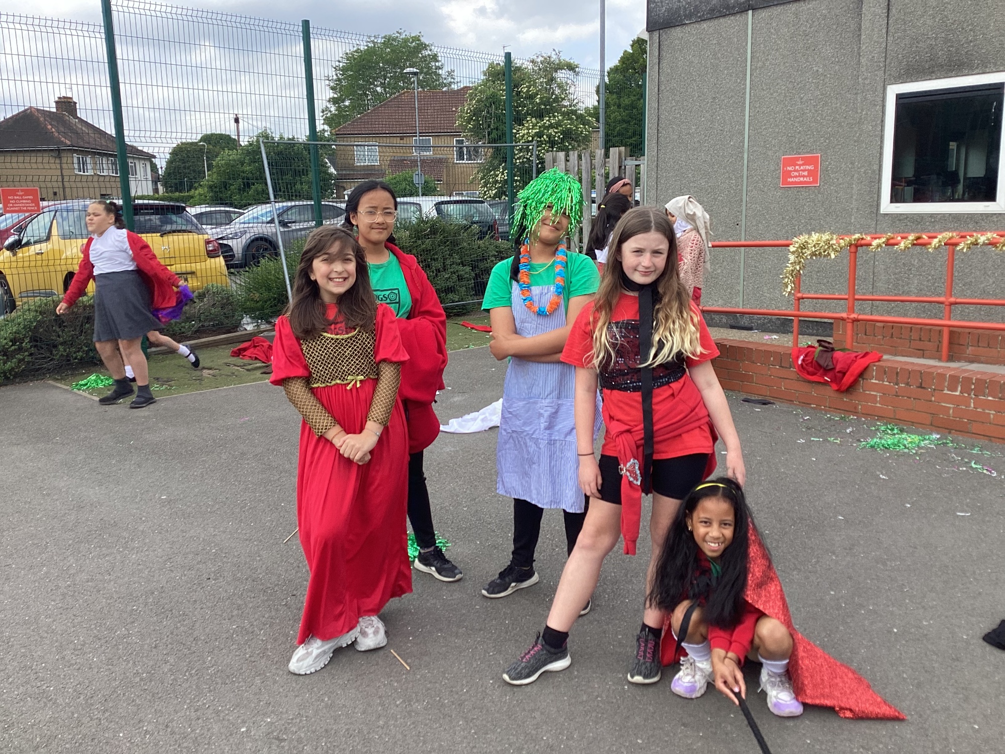 Children using dressing up clothes