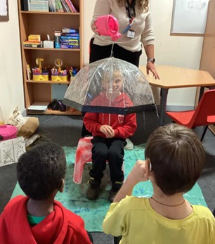SRP photo of child with umbrella